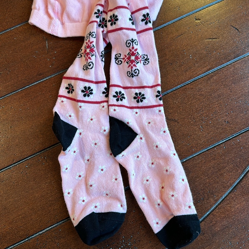 NWOT Hanna Andersson Tights.  Pink w/ black and white flowers. Size 150/160.